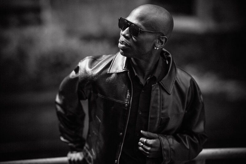 Man in sunglasses leather jacket portrait