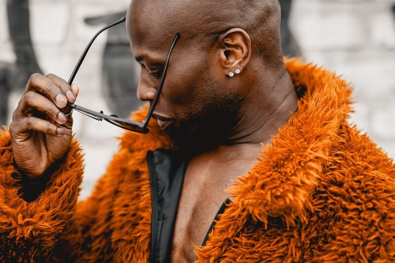 Man in orange coat portrait
