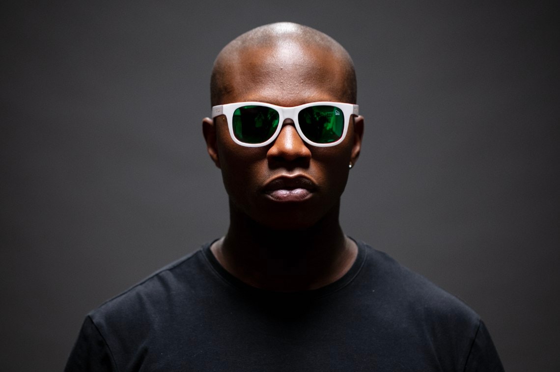 Man in white sunglasses white background